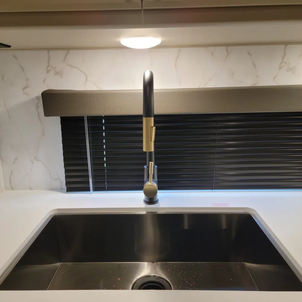 2027-cougar-half-ton-26rke-fw-kitchen-3